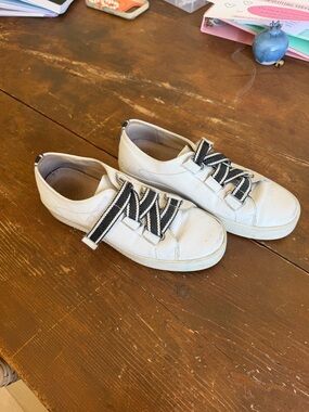 Mollini Lafay white leather sneakers with black and white statement straps
